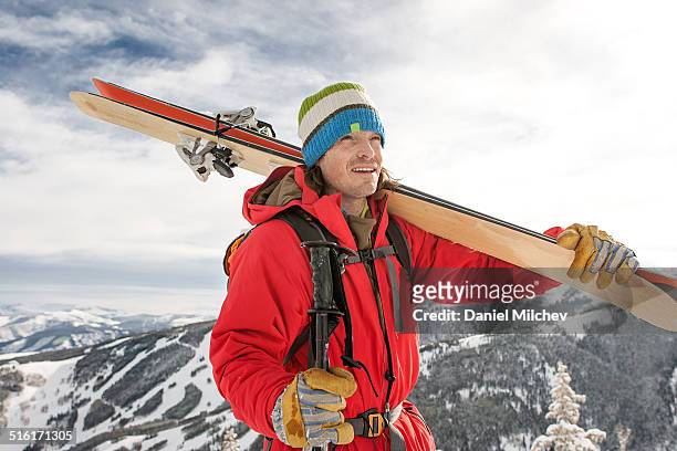 skier hiking in the mountain. - beaver creek colorado stock pictures, royalty-free photos & images