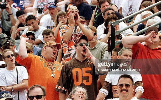 Cleveland Browns fans in the crowd during the introduction of enshrinee and former Cleveland Brown player Ozzie Newsome boo at the mention of former...