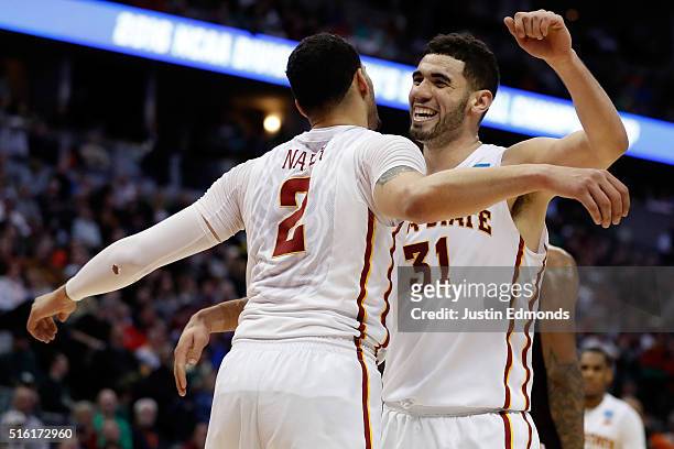 Georges Niang reacts with Abdel Nader of the Iowa State Cyclones after a basket against the Iona Gaels during the first round of the 2016 NCAA Men's...