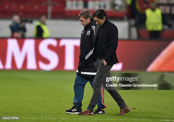 Roger Schmidt head coach of Bayer Leverkusen looks dejected as they lose 2-0 on aggregate after the UEFA Europa League round of 16, second leg match...