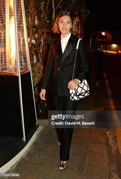 Arizona Muse arrives at a dinner hosted by Roger Vivier to celebrate the Prismick Denim collection by Camille Seydoux at Casa Cruz on March 17, 2016...
