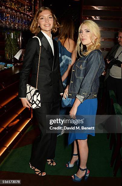 Arizona Muse and Camille Seydoux attend a dinner hosted by Roger Vivier to celebrate the Prismick Denim collection by Camille Seydoux at Casa Cruz on...
