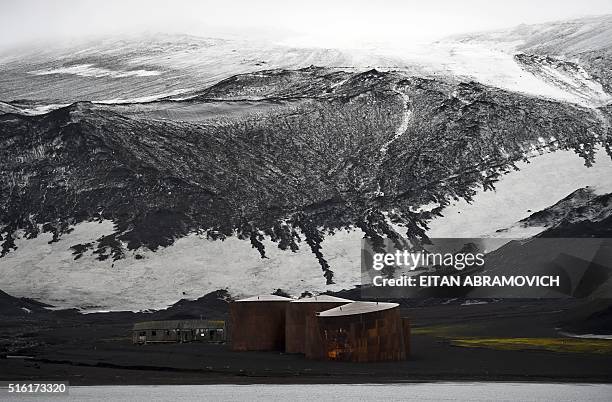 An old building of the Hector Whaling Company crumbles at Whalers Bay in Deception Island, in the western Antarctica peninsula on March 06, 2016. In...