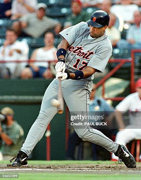 Tony Clark of the Detroit Tigers connects for a solo homerun in the third inning of play versus the Texas Rangers at The Ballpark in Arlington in...