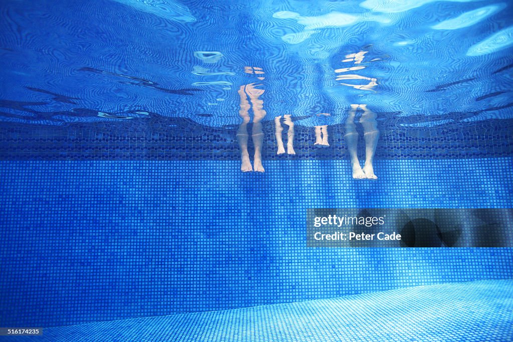 Swimming pool , family ,  legs