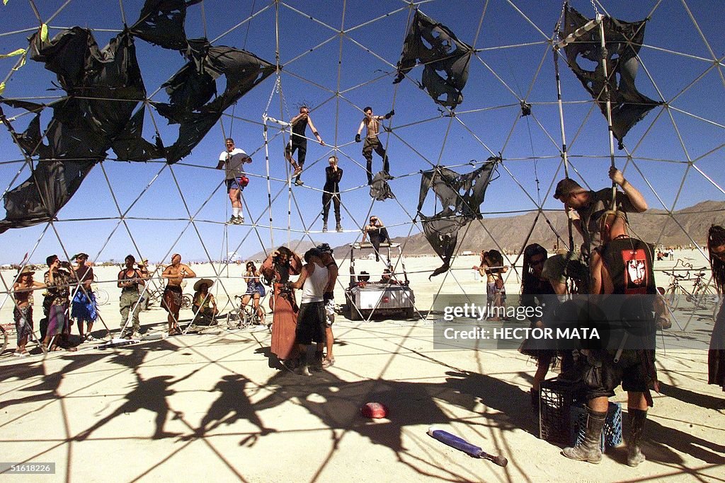 A group of people prepare the fighters under the "