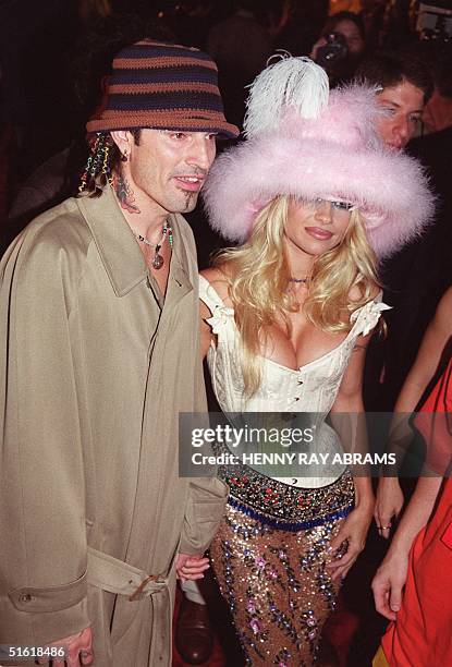 Rock musician Tommy Lee and his wife actress Pamela Anderson Lee arrive for the MTV Video Music Awards at the Metropolitan Opera House at Lincoln...