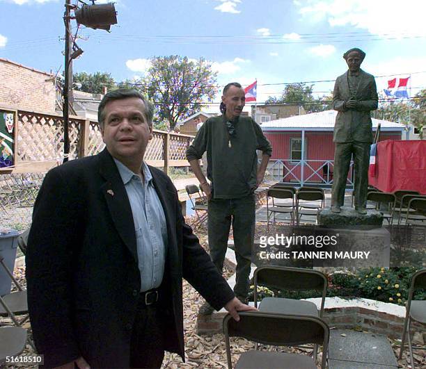 Jose Lopez directs the preparations for a celebration 10 September 1999 in Chicago as family members await the return from prison of Alejandrina...