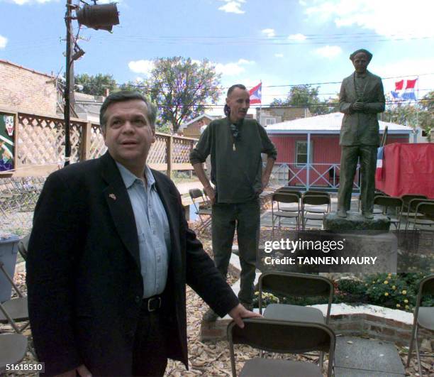 Jose Lopez directs the preparations for a celebration 10 September 1999 in Chicago as family members await the return from prison of Alejandrina...