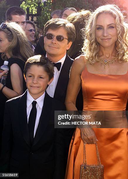 Actor Michael J. Fox , his wife, Tracey Pollack and son, Sam arrive at the 51st Emmy Awards at the Shrine Auditorium in Los Angeles 12 September,...