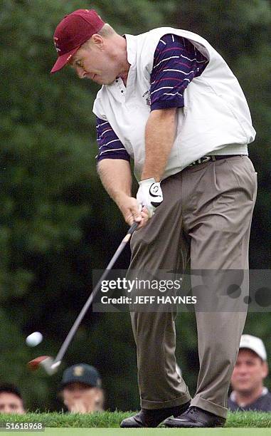 Ryder Cup team member Hal Sutton hits a tee shot on the third hole 22 September 1999 during the second practice day at the Country Club in Brookline,...