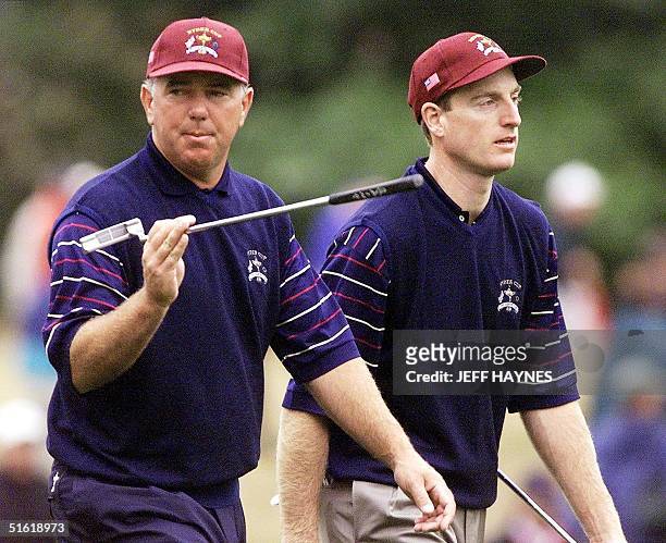 Ryder Cup team members Mark O'Meara and Jim Furyk walk down the fairway on the sixth hole 22 September 1999 during the second practice day at the...