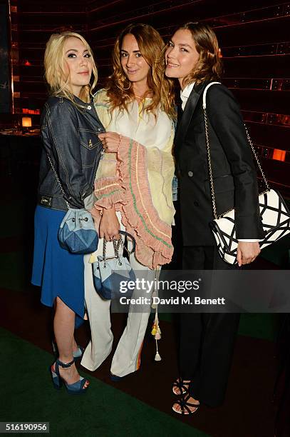Camille Seydoux, Alexia Niedzielski and Arizona Muse attend a dinner hosted by Roger Vivier to celebrate the Prismick Denim collection by Camille...