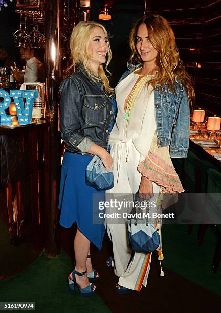 Camille Seydoux and Alexia Niedzielski attend a dinner hosted by Roger Vivier to celebrate the Prismick Denim collection by Camille Seydoux at Casa...