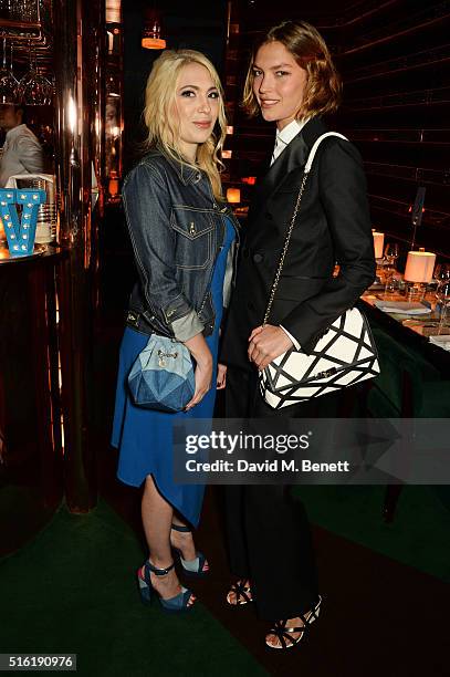 Camille Seydoux and Arizona Muse attend a dinner hosted by Roger Vivier to celebrate the Prismick Denim collection by Camille Seydoux at Casa Cruz on...