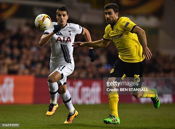 Tottenham Hotspur's Argentinian midfielder Erik Lamela vies with Borussia Dortmund's Greek defender Sokratis during the UEFA Europa League round of...