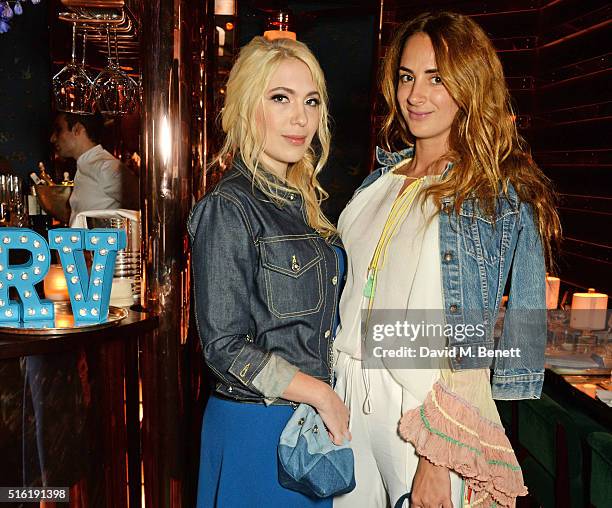 Camille Seydoux and Alexia Niedzielski attend a dinner hosted by Roger Vivier to celebrate the Prismick Denim collection by Camille Seydoux at Casa...