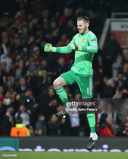 David de Gea of Manchester United celebrates Anthony Martial scoring their first goal during the UEFA Europa League Round of 16 Second Leg match...