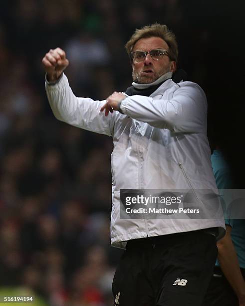 Manager Jurgen Klopp of Liverpool celebrates Philippe Coutinho scoring their first goal during the UEFA Europa League Round of 16 Second Leg match...