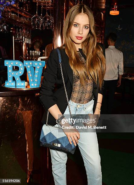 Xenia Tchoumitcheva attends a dinner hosted by Roger Vivier to celebrate the Prismick Denim collection by Camille Seydoux at Casa Cruz on March 17,...