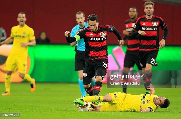 Bayer Leverkusen's Hakan Calhanoglu in action during the UEFA Europa League round of 16 second leg soccer match between Bayer Leverkusen and...