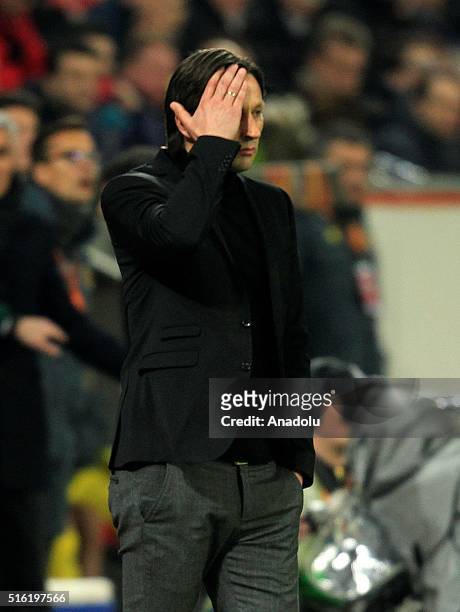 Bayer Leverkusen's Roger Schmidt reacts at the end of the UEFA Europa League round of 16 second leg soccer match between Bayer Leverkusen and...