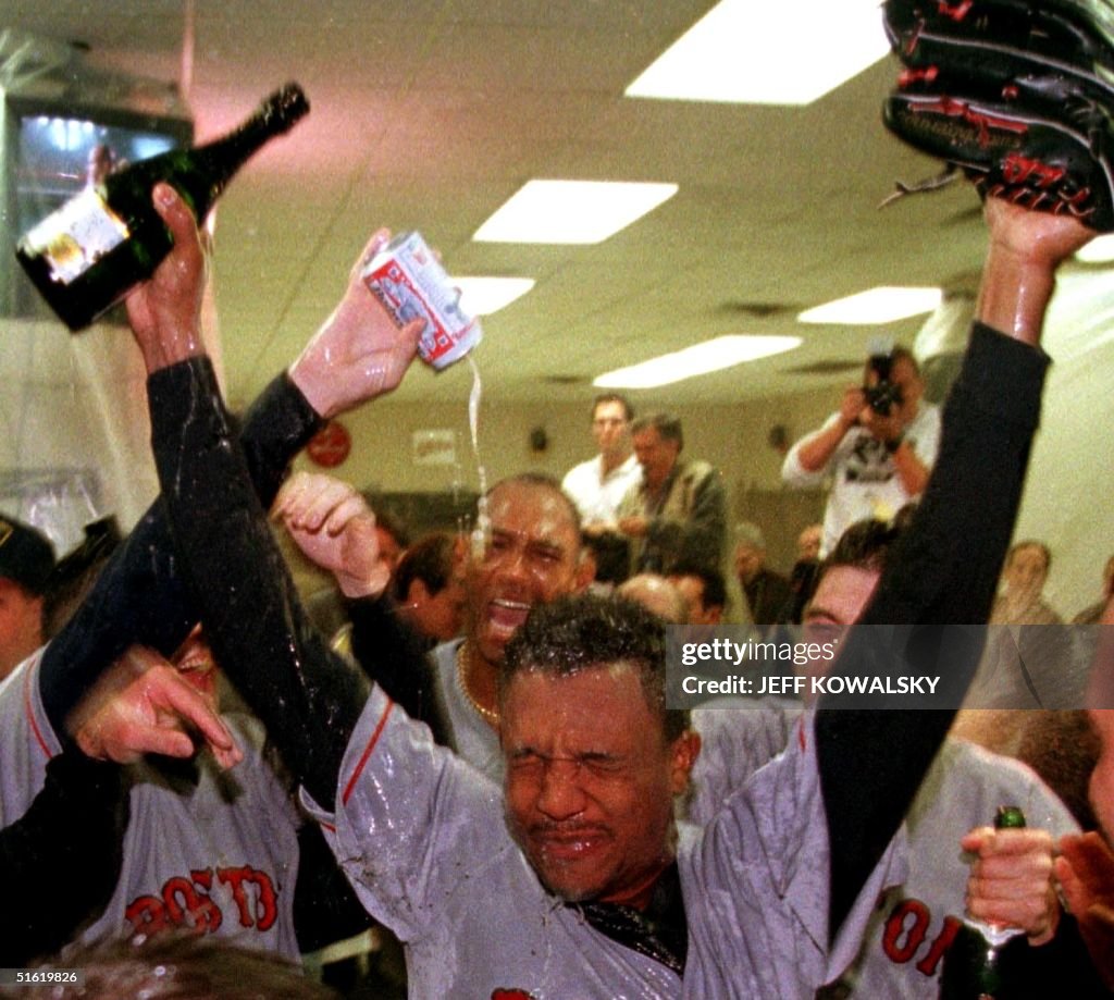 Boston Red Sox Pedro Martinez is sprayed with cham
