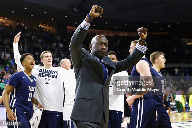 Head coach James Jones of the Yale Bulldogs celebrates defeating the Baylor Bears 79-75 during the first round of the 2016 NCAA Men's Basketball...