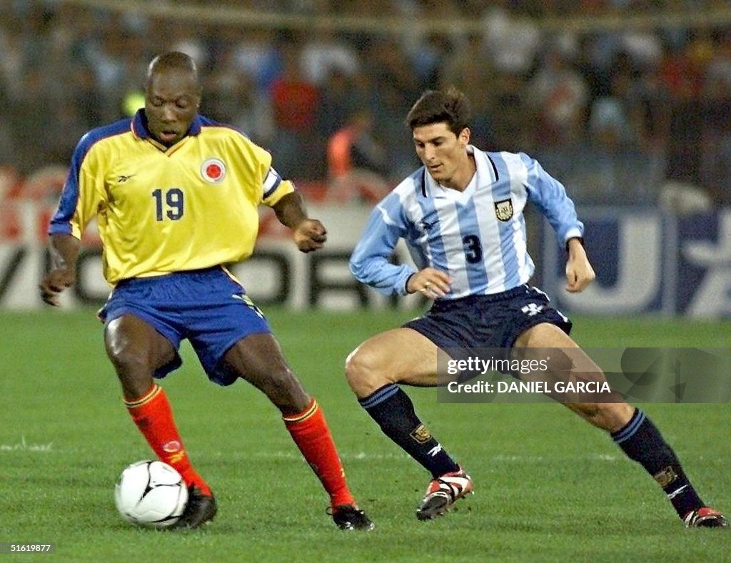 Colombia's Freddy Rincon (19) takes the ball from
