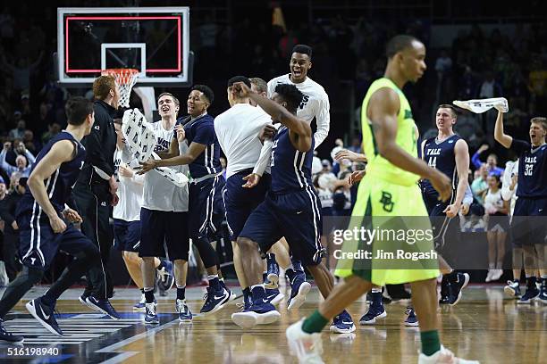 The Yale Bulldogs celebrate defeating the Baylor Bears 79-75 during the first round of the 2016 NCAA Men's Basketball Tournament at Dunkin' Donuts...