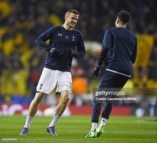 Eric Dier and Erik Lamela of Spurs warm up prior to kickoff during the UEFA Europa League round of 16, second leg match between Tottenham Hotspur and...