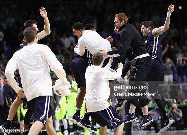 The Yale Bulldogs celebrate defeating the Baylor Bears 79-75 during the first round of the 2016 NCAA Men's Basketball Tournament at Dunkin' Donuts...