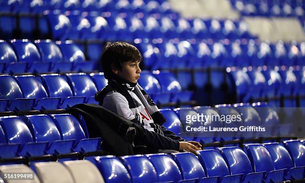 Young Spurs fan looks on prior to the UEFA Europa League round of 16, second leg match between Tottenham Hotspur and Borussia Dortmund at White Hart...