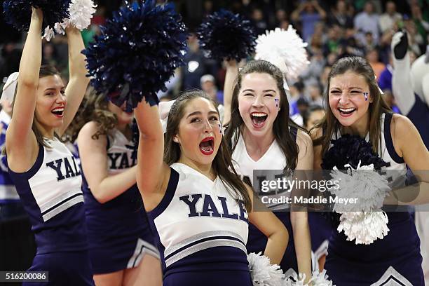 Yale Bulldogs cheerleaders celebrate after the Yale Bulldogs defeated the Baylor Bears 79-75 during the first round of the 2016 NCAA Men's Basketball...