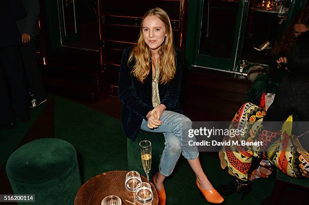 Alexandra Carl attends a dinner hosted by Roger Vivier to celebrate the Prismick Denim collection by Camille Seydoux at Casa Cruz on March 17, 2016...