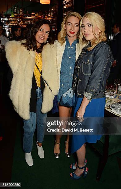 Lycia Sebah, Sabine Getty and Camille Seydoux attend a dinner hosted by Roger Vivier to celebrate the Prismick Denim collection by Camille Seydoux at...