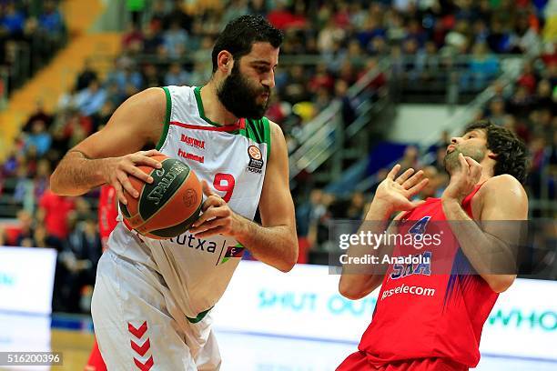 Milo Teodosi of CSKA Moscow vies with Ioannis Bourousis of Laboral Kutxa during the Turkish Airlines Euroleague Top 16 match between CSKA Moscow and...