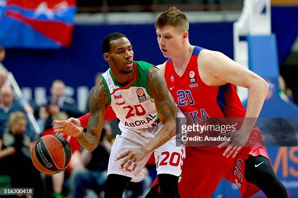 Andrey Vorontsevich of CSKA Moscow vies with Darius Adams of Laboral Kutxa during the Turkish Airlines Euroleague Top 16 match between CSKA Moscow...