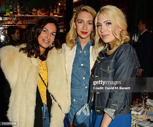 Lycia Sebah, Sabine Getty and Camille Seydoux attend a dinner hosted by Roger Vivier to celebrate the Prismick Denim collection by Camille Seydoux at...