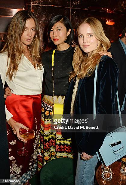 Quentin Jones, Mimi Xu and Alexandra Carl attend a dinner hosted by Roger Vivier to celebrate the Prismick Denim collection by Camille Seydoux at...