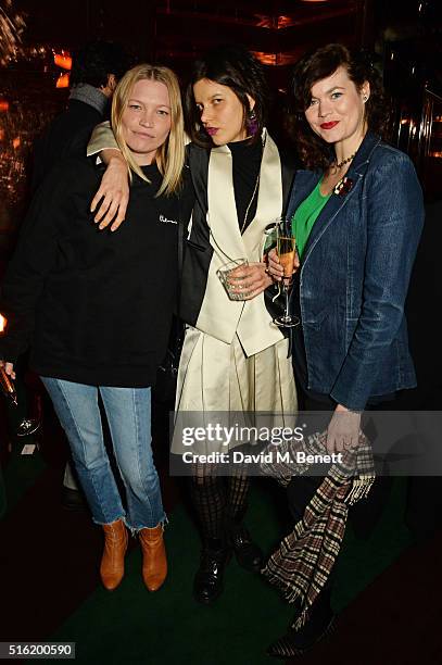 Sara Gilmour, Tati Cotliar and Jasmine Guinness attend a dinner hosted by Roger Vivier to celebrate the Prismick Denim collection by Camille Seydoux...