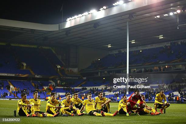 Borussia Dortmund players look on in victory after the UEFA Europa League round of 16, second leg match between Tottenham Hotspur and Borussia...