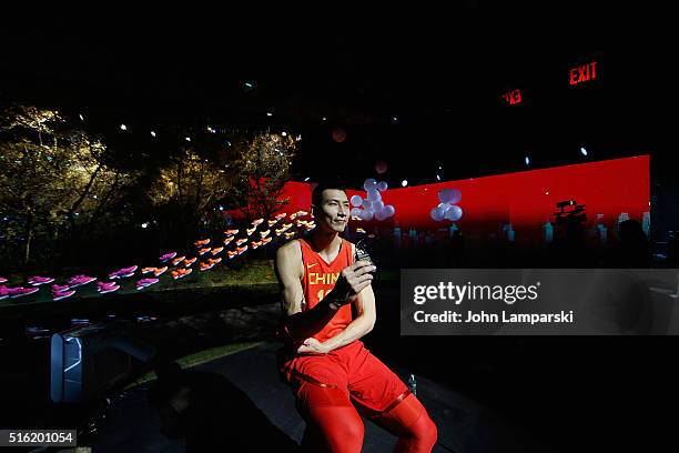 Chinese basketball player Yi Jianlian attends the 2016 Olympics Uniforms for USA and International Federations debut at Skylight at Moynihan Station...