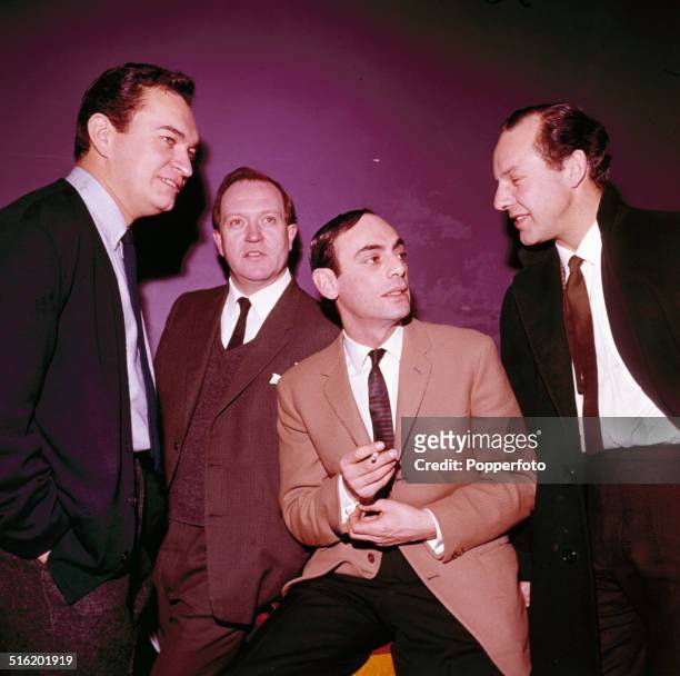 Actors Derek Godfrey , Roddy McMillan , John Bennett and Harry Towb pictured together on the set of the television drama series 'Front Page Story' in...