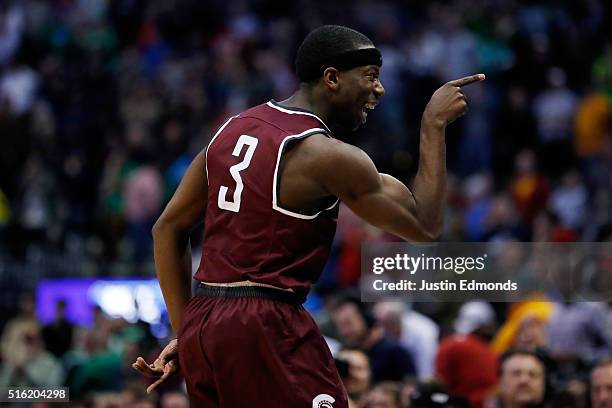 Josh Hagins of the Arkansas Little Rock Trojans reacts after the game against the Purdue Boilermakers goes into overtime during the first round of...