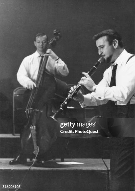 American Jazz musician Pete Fountain plays clarinette with an unidentified bassist, New York, 1967.