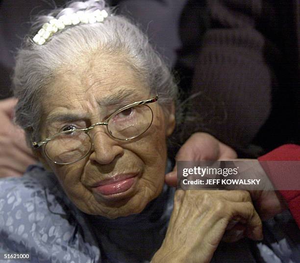 This 01 December 2001 file photo shows US civil rights legend Rosa Parks attending at the Henry Ford Museum in Dearborn, Michigan, during a ceremony...