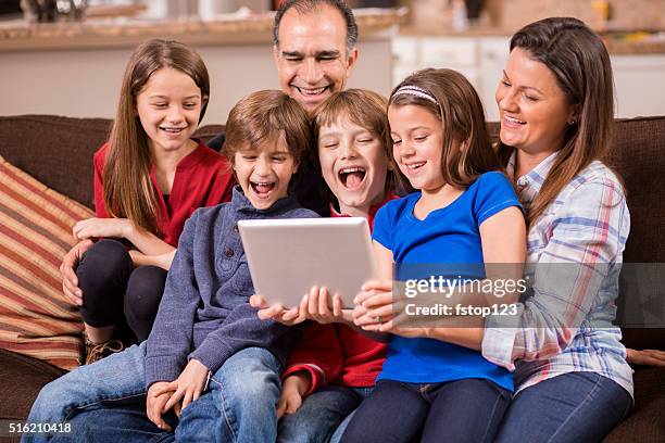 Family Using Digital Technology Family Using Digital Tablet At Home Children Parents Technology High ...