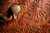 Detail Of A Leather Horse Saddle Tooled With Filigree Design