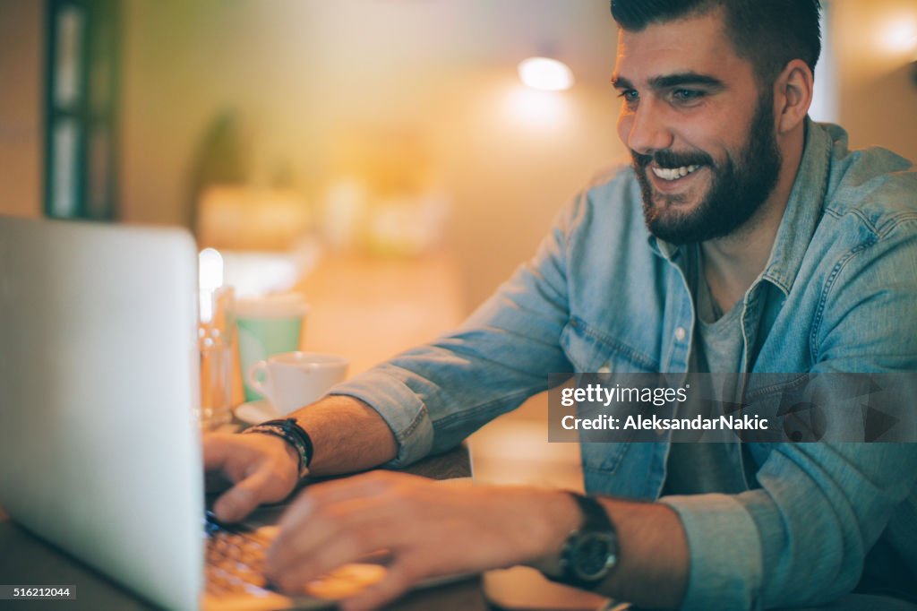 Use Computer Cafe Using Computer In A Cafe High-Res Stock Photo - Getty Images